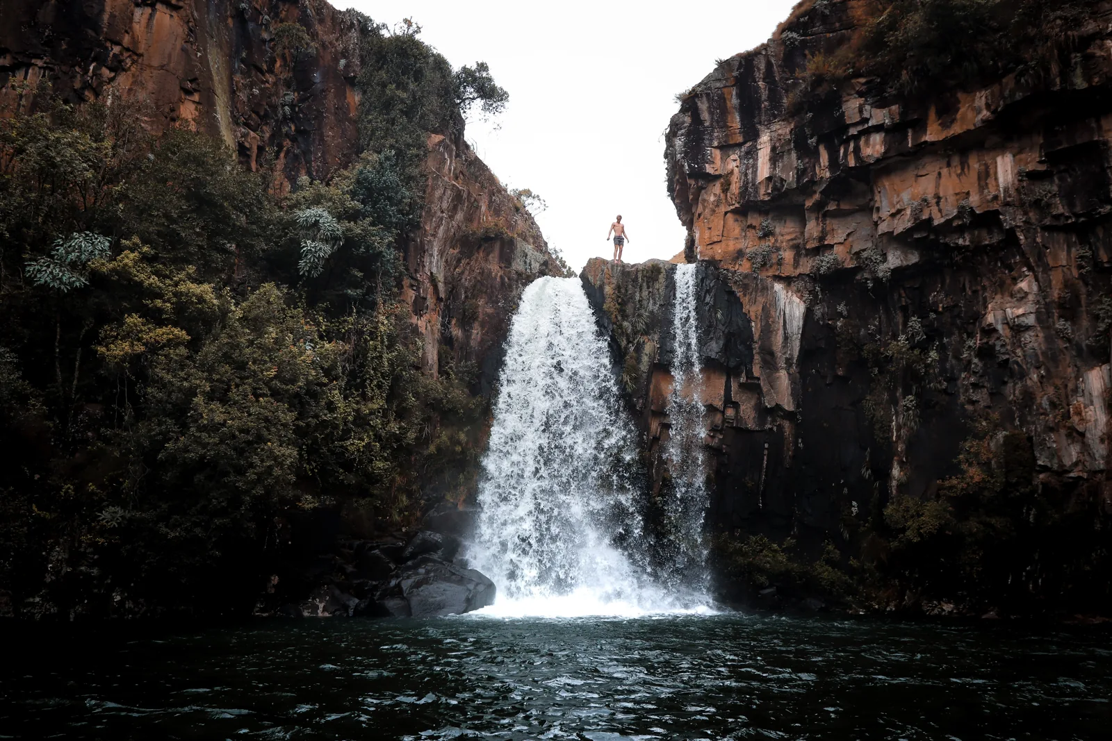A river waterfall between rocky cliffs at Cobham near Underberg.
